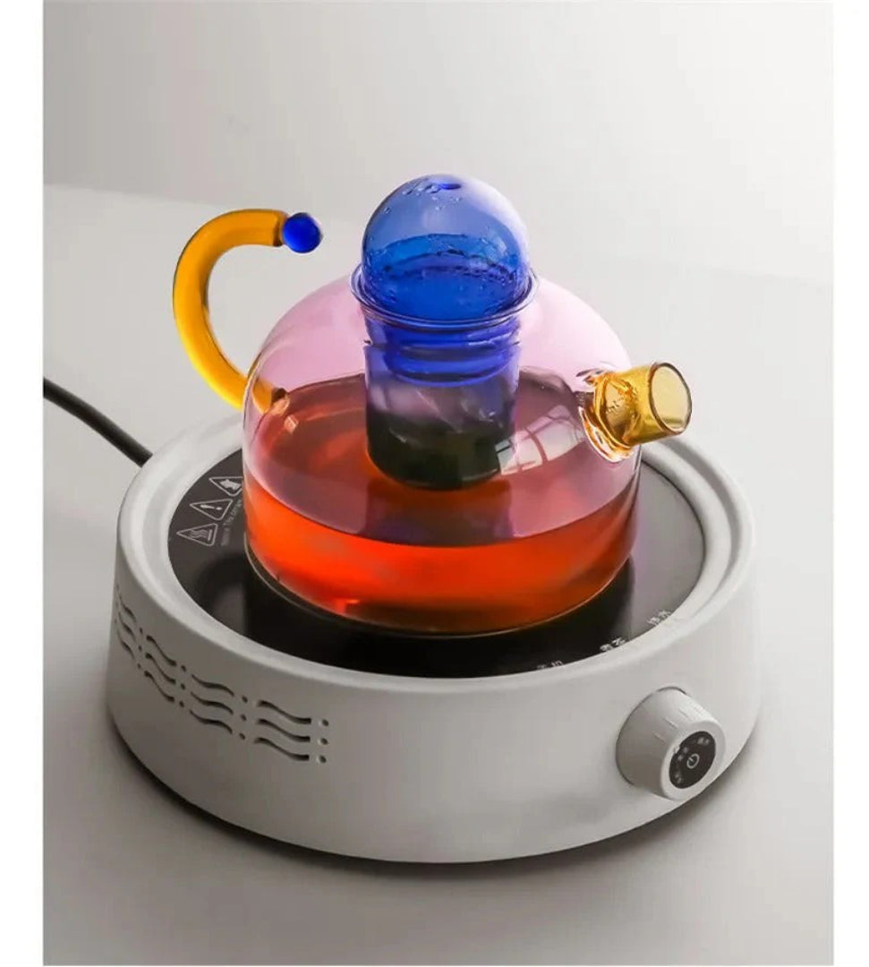 Moderne glazen theepot met kopje