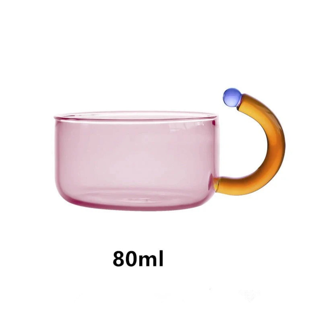 Moderne glazen theepot met kopje
