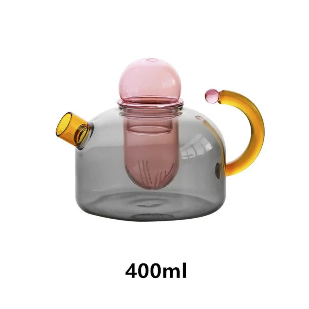 Moderne glazen theepot met kopje